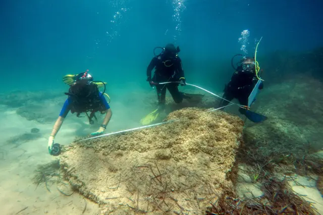 Archaeologists diving off the coast of Nabeul in northeastern Tunisia