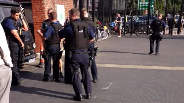 Armed police at the Oval