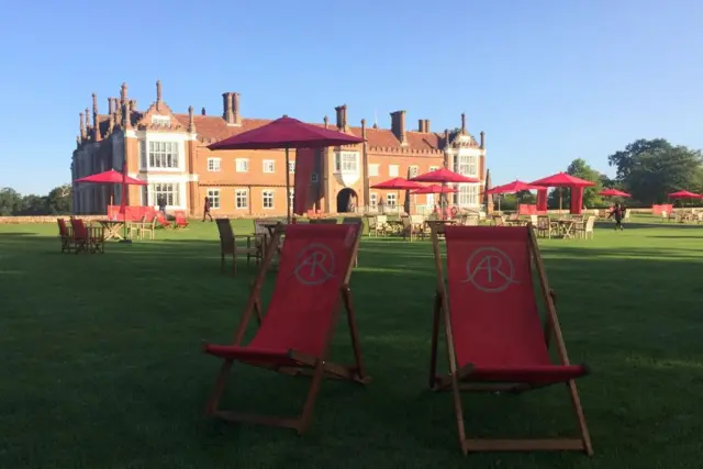 Antiques Roadshow tables and chairs, set up in the grounds of Helmingham Hall