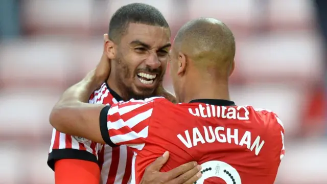 Lewis Grabban celebrates with James Vaughan