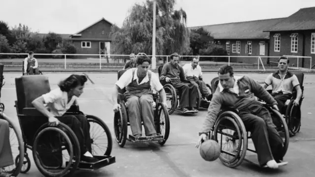 A  game of wheelchair netball between a Dutch team from Aardenburg and the British team was photographed at the Spinal Centre at Stoke Mandeville Hospital, Buckinghamshire