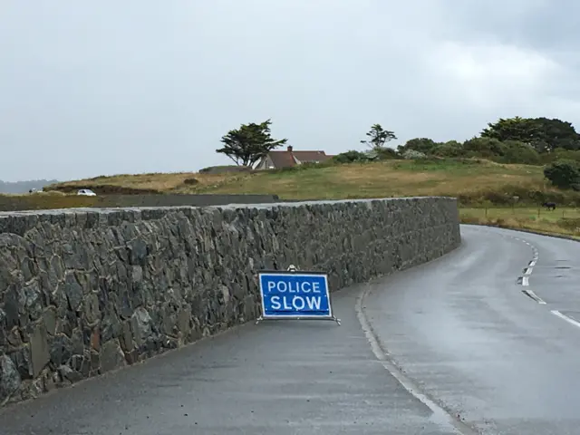 Police road closed sign