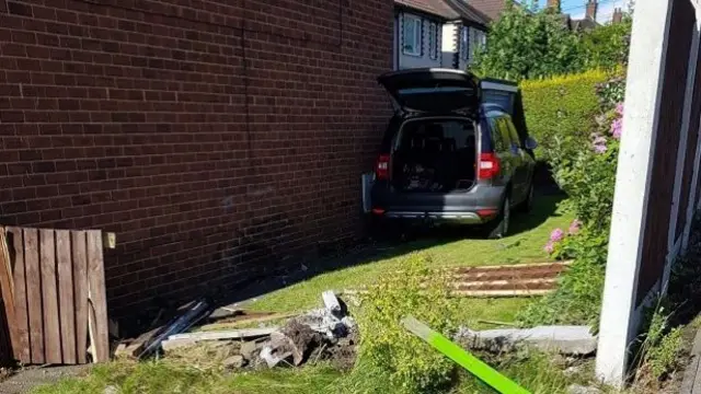 The car after crashing into the garden of a house in Northfleet Street, Bucknall