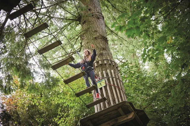 Girl on Go Ape course