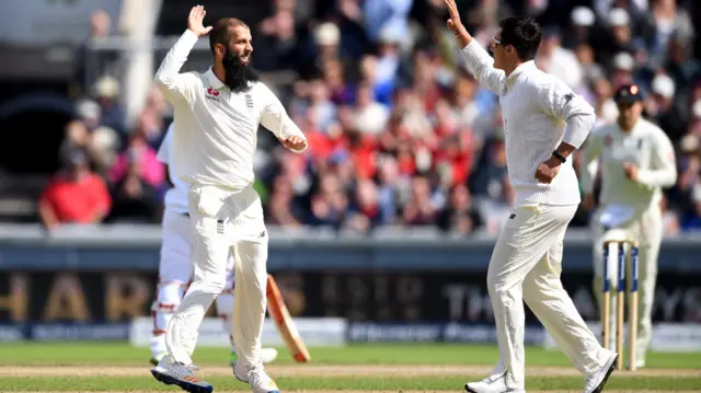 Moeen Ali (left)