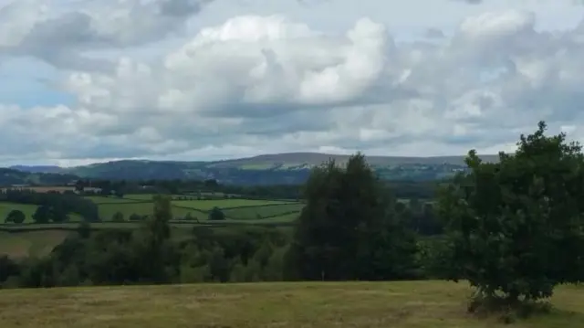 cloud over fields