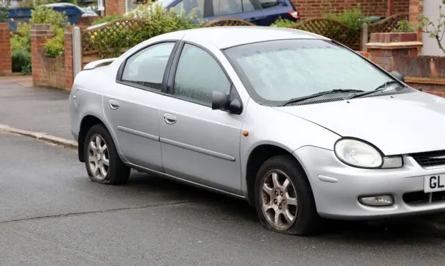 Vandalised car in Luton