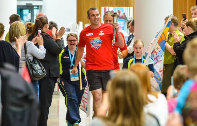 Special Olympic flame carried through Meadowhall