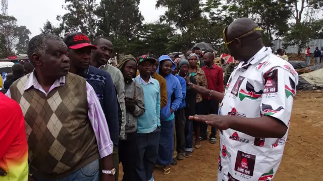 Man talking to voters