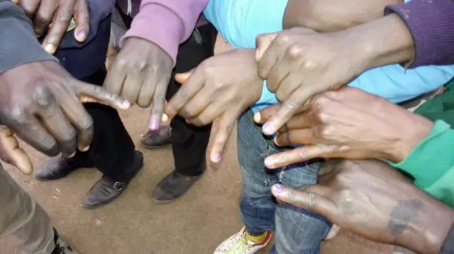 Voters showing their fingers