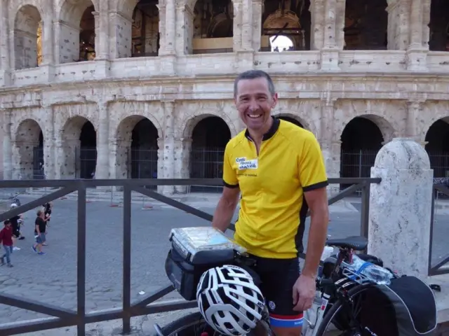 Dave edwards in front of the colosseum