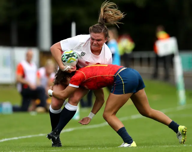 Sarah Bern of England is tackled by Iera Echebarria of Spain