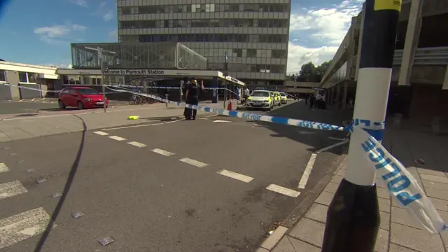 Plymouth railway station closed off by police