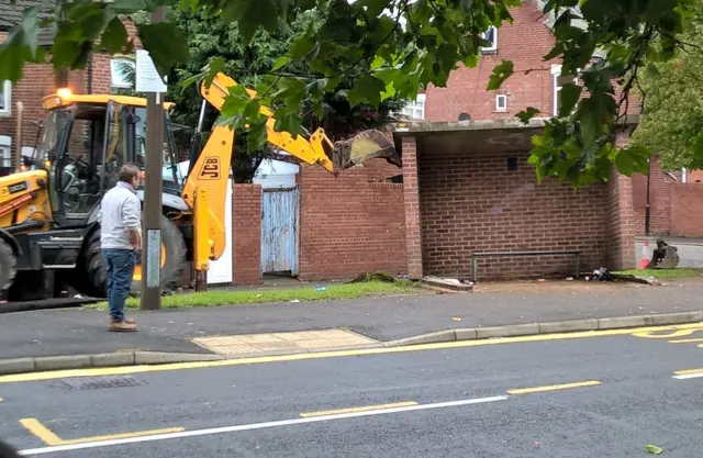 Bus shelter demolition