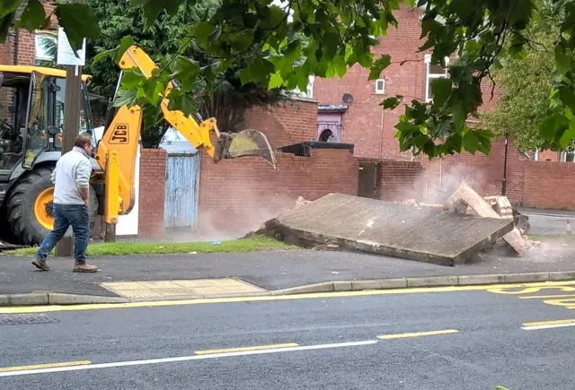 Demolished bus shelter