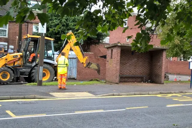 Bus shelter demolition