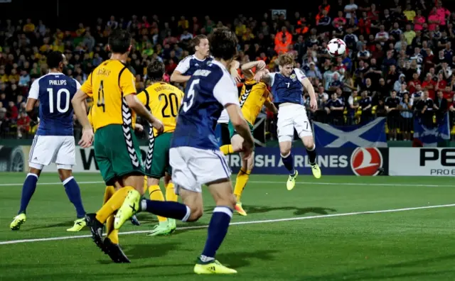 Stuart Armstrong rises to head Scotland into the lead