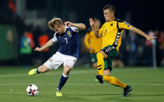 Scotland's Stuart Armstrong and Lithuania's Egidijus Vaitkunas