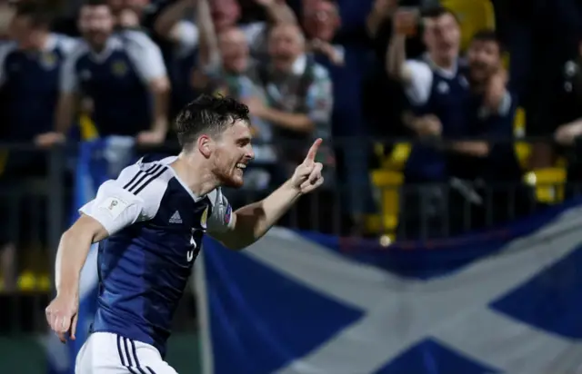 Andy Robertson celebrates putting Scotland two up