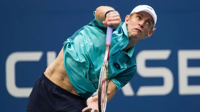 Kevin Anderson of South Africa serves