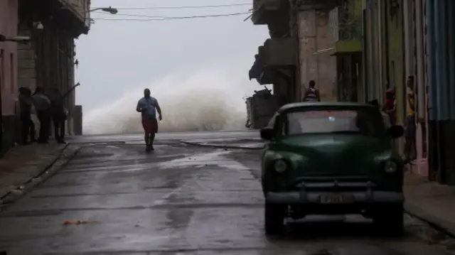 Waves crash on the street as Hurricane Irma turns toward the Florida Keys on Saturday, in Havana, Cuba September 9