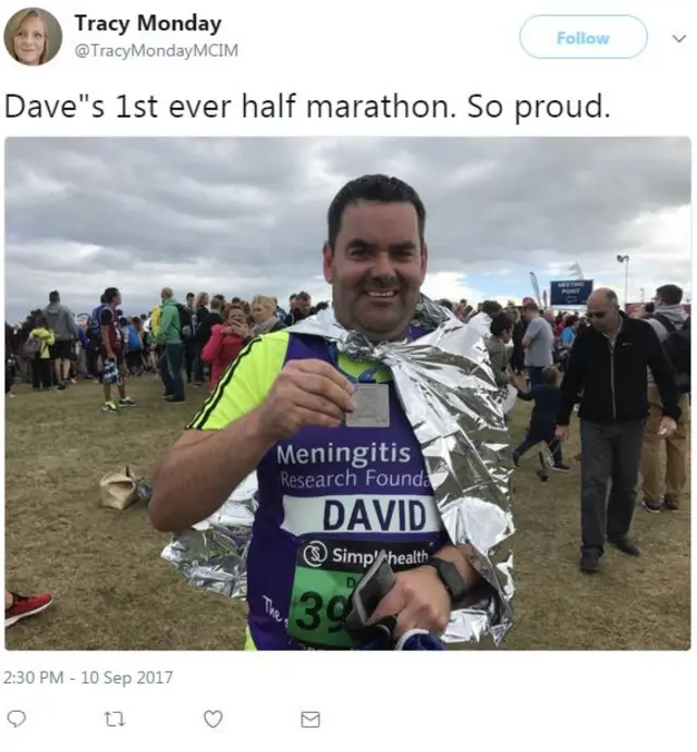 A Great North Run finisher with his medal