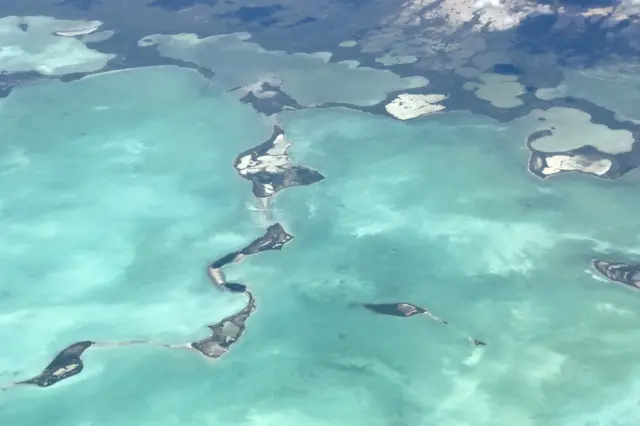 Aerial shot of Florida Keys show shallow islands surrounded by ocean