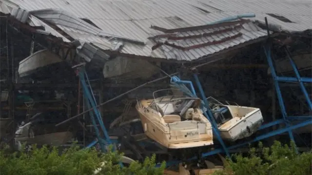 A boat storage unit in Hollywood, Florida, was destroyed by high winds