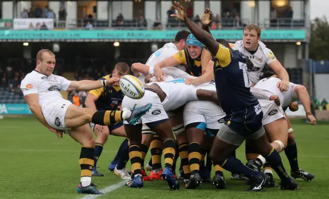 Dan Robson of Wasps kicks the ball upfield during the Aviva Premiership match between Worcester Warriors and Wasps at Sixways Stadium