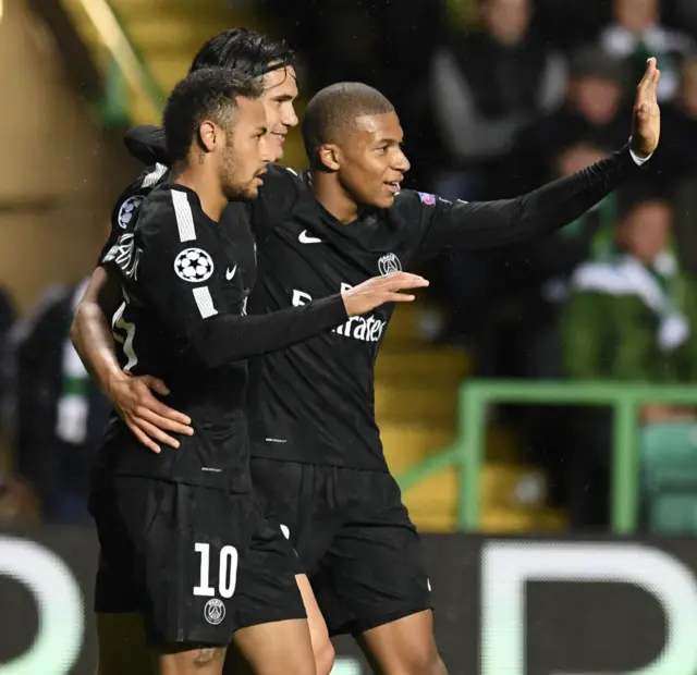 Neymar celebrates with fellow goalscorers Edison Cavani and Kylian Mbappe