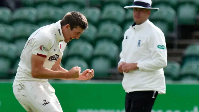 Craig Overton celebrates