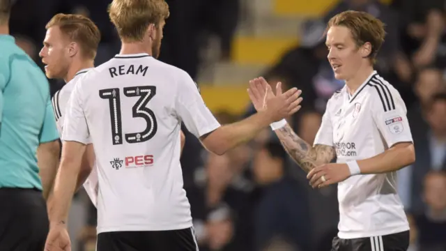 Stefan Johansen of Fulham celebrates his goal with Tim Ream, 2-1