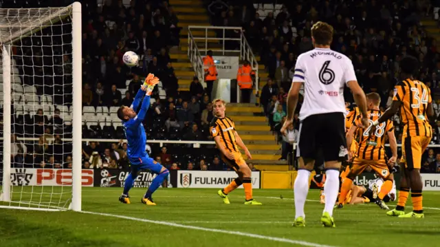 Goalkeeper Allan McGregor of Hull City denies Fulham with a fine close range save