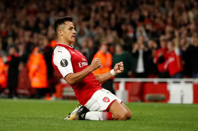 Alexis Sanchez celebrates scoring