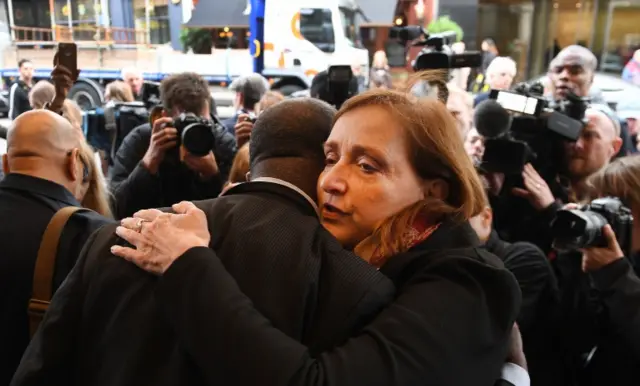 Emma Dent Coad consoles a Grenfell resident