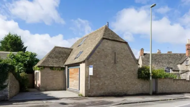 Public toilet converted to a home in Witney