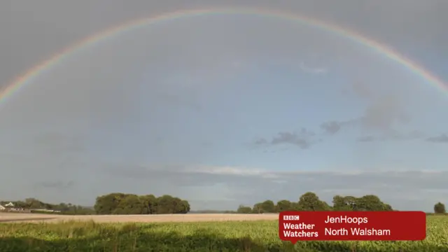 Rainbow over open farmland