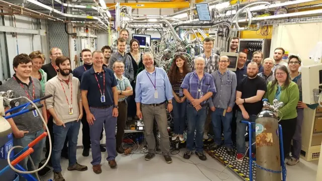 Prof Andrew Evans (front row, third from left) with colleagues at the new VERSOX facility