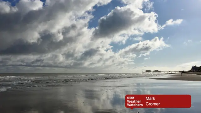 Grey clouds over a beach