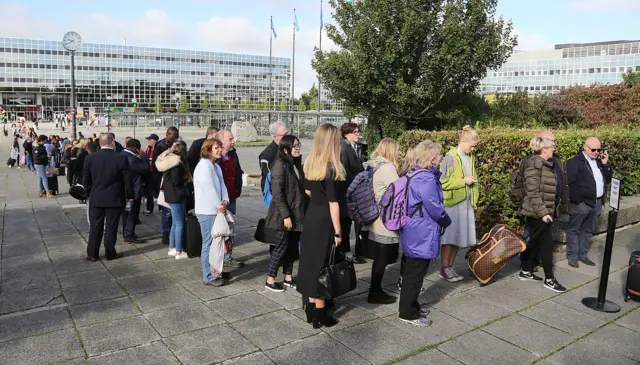 Queues of commuters at Milton Keynes railway station