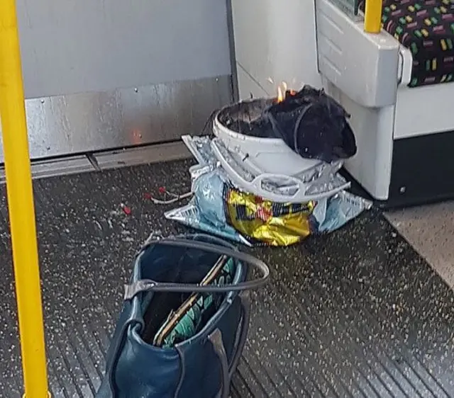 Bucket on Tube train