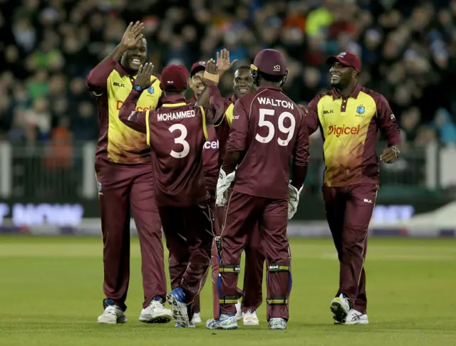 West Indies celebrate dismissing Jonny Bairstow