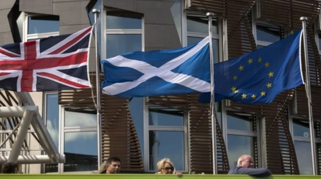 UK, saltire and EU flag