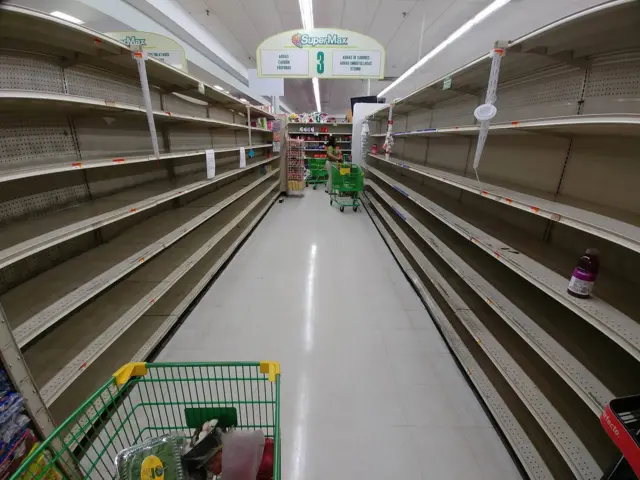 Empty shelves at a supermarket in San Juan, Puerto Rico