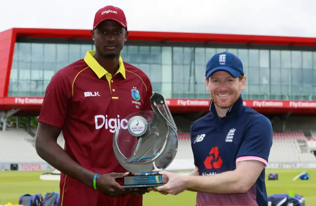 Jason Holder and Eoin Morgan