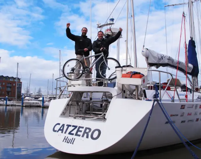 Two men stood on the Catzero boat.