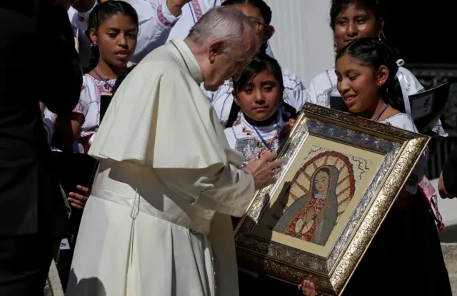 Image of the Virgin of Guadalupe held by a member of a Mexican choir during the Wednesday general audience in Saint Peter"s Square at the Vatican, September 20, 2017.