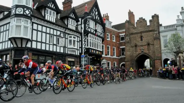 Cyclists going through Beverley's North Bar.