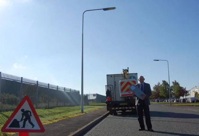 Councillor Richard Hannigan with one of the new energy efficient street lights.