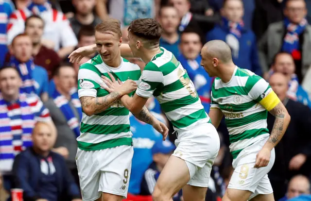 Leigh Griffiths celebrates scoring Celtic's second goal at Ibrox